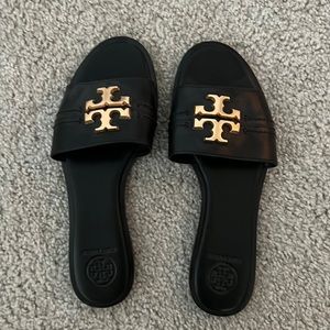 Black leather Tory brunch sandals. I’m excellent condition never worn. Size 6.5